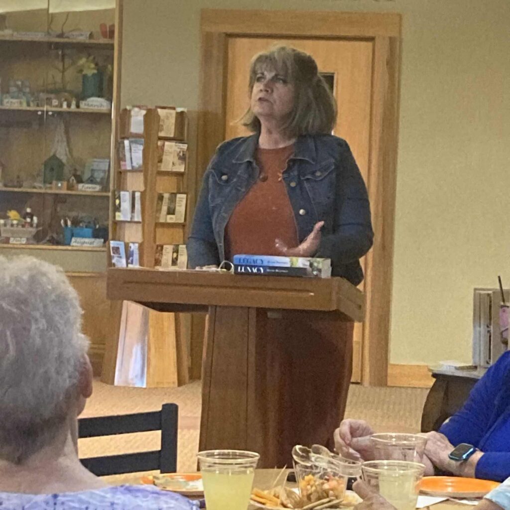 Anna Bradfield speaking at an event.