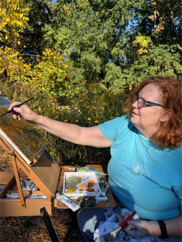 The author, painting at the Pollinator Garden in Thomasville GA